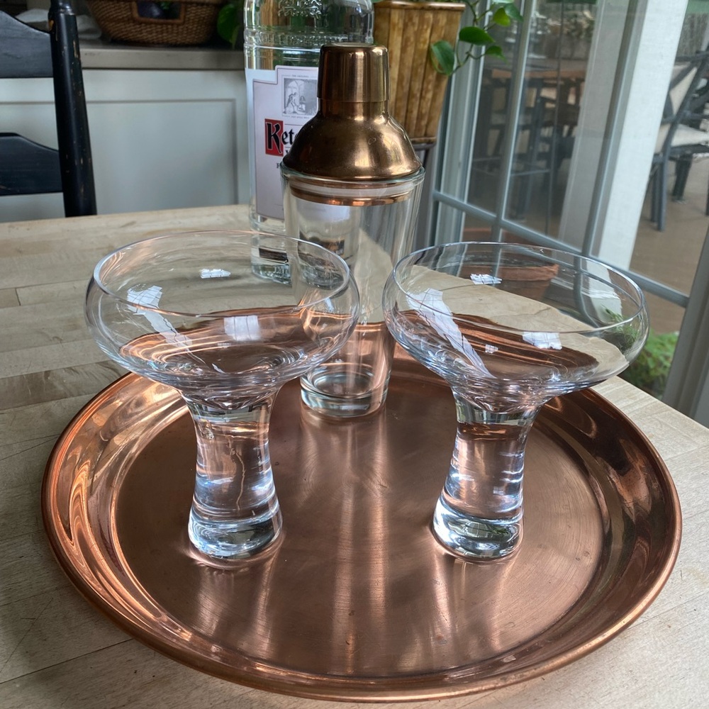 Set of two (2) uniquely shaped martini glasses with a copper-top shaker. Cheers!